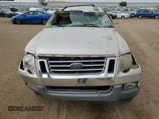 2007 Ford Explorer Sport Trac XLT z VIN 1FMEU51807UA22414, wystawiony jako Copart lot #61463125 z przebiegiem 212 871 mil mil oraz Czysty tytuł • Clean title. Historia ofert i sprzedaży dostępna na DreamBid. Obrazek 5.