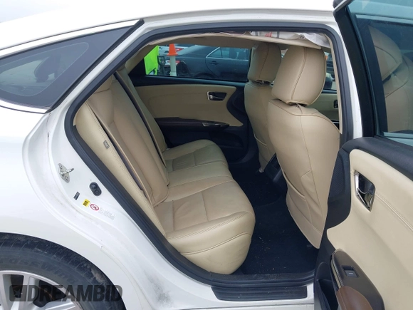 2014 Toyota Avalon Limited z VIN 4T1BK1EB6EU098479, wystawiony jako IAAI lot #42171736 z przebiegiem 92 290 mil mil oraz . Historia ofert i sprzedaży dostępna na DreamBid. Obrazek 8.