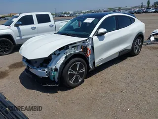 2021 Ford Mustang Mach-E Select z VIN 3FMTK1RM1MMA49774, wystawiony jako IAAI lot #42462914 z przebiegiem 16 754 mil mil oraz . Historia ofert i sprzedaży dostępna na DreamBid. Obrazek 2.