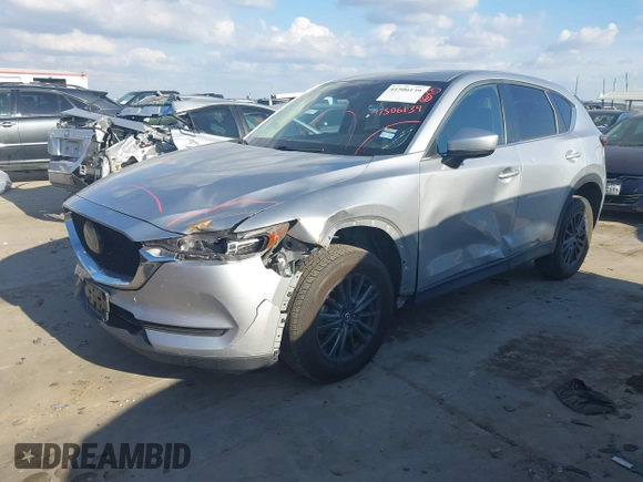 2020 Mazda CX-5 Touring with VIN JM3KFACMXL1786200, listed as a IAAI auction lot 41506139 with 121,944 mi miles. Bid and sale history available at carsss.com. Image 18.