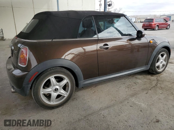 2010 MINI Convertible with VIN WMWMR3C50ATU97547, listed as a Copart auction lot 44780185 with 91,194 mi miles and Salvage Title. Bid and sale history available at DreamBid. Image 3.