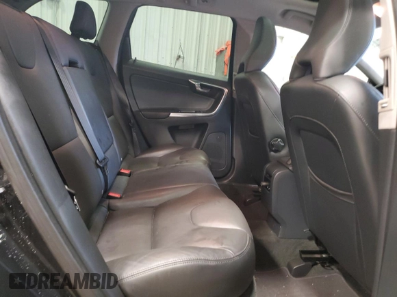 2015 Volvo XC60 z VIN YV4902RD7F2596257, wystawiony jako Copart lot #80564274 z przebiegiem 89 710 mil mil oraz Nie do naprawy • Non repairable. Historia ofert i sprzedaży dostępna na DreamBid. Obrazek 11.