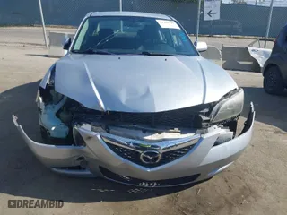 2007 Mazda Mazda3 i Touring with VIN JM1BK32F571741268, listed as a IAAI auction lot 39969197 with 165,705 mi miles. Bid and sale history available at carsss.com. Image 6.