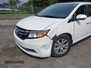 2016 Honda Odyssey EX-L z VIN 5FNRL5H64GB059309, wystawiony jako IAAI lot #42367538 z przebiegiem 121 742 mil mil oraz . Historia ofert i sprzedaży dostępna na DreamBid. Obrazek 6.
