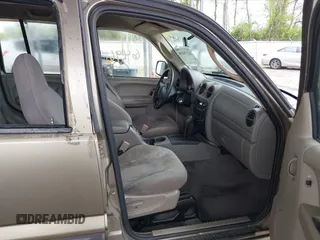 2003 Jeep Liberty Sport z VIN 1J4GK48K63W602709, wystawiony jako IAAI lot #42176496 z przebiegiem 151 397 mil mil oraz . Historia ofert i sprzedaży dostępna na DreamBid. Obrazek 5.