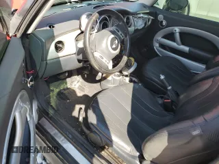 2004 MINI Hardtop with VIN WMWRC33484TJ53757, listed as a Copart auction lot 48534305 with 166,771 mi miles and Salvage Title. Bid and sale history available at DreamBid. Image 8.