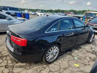 2014 Audi A6 Prestige with VIN WAUHGAFCXEN008586, listed as a Copart auction lot 60304815 with 133,577 mi miles and Salvage title. Bid and sale history available at DreamBid. Image 3.