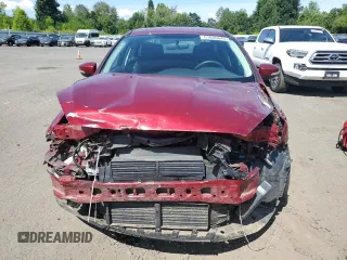 2016 Ford Focus SE with VIN 1FADP3F28GL221688, listed as a Copart auction lot 61846645 with 82,934 mi miles and Salvage title. Bid and sale history available at DreamBid. Image 5.