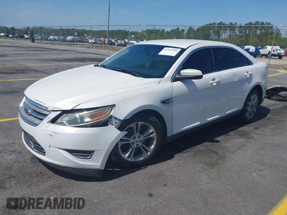 2014 Ford Taurus SEL with VIN 1FAHP2E86EG132676, listed as a IAAI auction lot 41943392 with 183,633 mi miles. Bid and sale history available at carsss.com. Image 2.