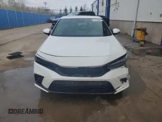 2022 Honda Civic Sport Touring z VIN 19XFL1G89NE400298, wystawiony jako Copart lot #56561415 z przebiegiem 81 456 mil mil oraz Czysty tytuł • Clean title. Historia ofert i sprzedaży dostępna na DreamBid. Obrazek 5.