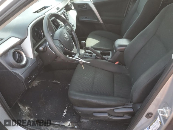 2018 Toyota RAV4 LE with VIN 2T3BFREV9JW754527, listed as a Copart auction lot 48119415 with 217,777 mi miles and Salvage Title. Bid and sale history available at carsss.com. Image 7.