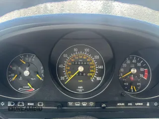 1987 Mercedes-Benz 560 SL with VIN WDBBA48D4HA059822, listed as a Copart auction lot 85827514 with 128,288 mi miles and Clean Title. Bid and sale history available at carsss.com. Image 8.
