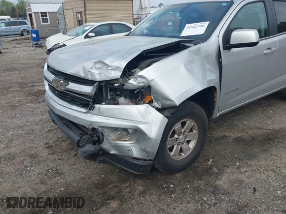 2019 Chevrolet Colorado 2WD Work Truck with VIN 1GCGSBEN3K1164686, listed as a IAAI auction lot 41943796 with 65,000 mi miles and . Bid and sale history available at DreamBid. Image 6.