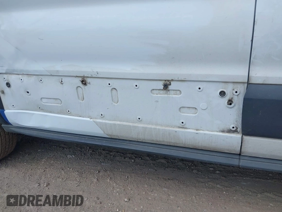2018 Ford Transit with VIN 1FTYR1CM1JKA69797, listed as a IAAI auction lot 42282537 with 184,498 mi miles and . Bid and sale history available at DreamBid. Image 6.