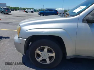 2006 Chevrolet TrailBlazer LS with VIN 1GNDS13S762123961, listed as a IAAI auction lot 42122088 with 241,349 mi miles and . Bid and sale history available at DreamBid. Image 14.