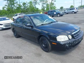 2006 Kia Optima LX z VIN KNAGD126565450701, wystawiony jako IAAI lot #42090541 z przebiegiem 146 352 mil mil oraz . Historia ofert i sprzedaży dostępna na DreamBid. Obrazek 1.