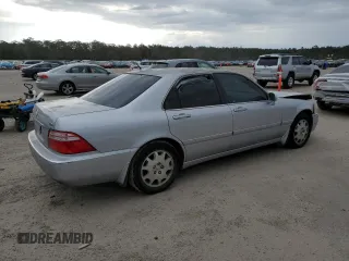 2004 Acura RL w/Navigation System z VIN JH4KA96664C003428, wystawiony jako Copart lot #87115774 z przebiegiem 164 527 mil mil oraz Szkoda całkowita • Salvage title. Historia ofert i sprzedaży dostępna na DreamBid. Obrazek 3.