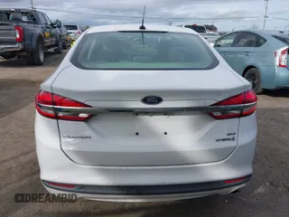 2018 Ford Fusion SE z VIN 3FA6P0LU5JR188171, wystawiony jako IAAI lot #41632358 z przebiegiem 73 677 mil mil oraz . Historia ofert i sprzedaży dostępna na DreamBid. Obrazek 16.