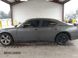 2010 Dodge Charger SXT with VIN 2B3CA3CV1AH250204, listed as a IAAI auction lot 41692787 with 111,757 mi miles. Bid and sale history available at carsss.com. Image 15.