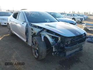 2018 Kia Stinger GT with VIN KNAE35LCXJ6021045, listed as a IAAI auction lot 41343519 with 71,343 mi miles. Bid and sale history available at carsss.com. Image 1.