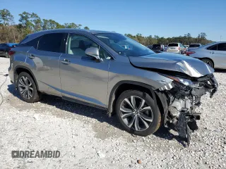 2022 Lexus RX 350 with VIN 2T2HZMDA2NC329679, listed as a Copart auction lot 42463005 with 36,914 mi miles and Salvage Title. Bid and sale history available at DreamBid. Image 4.