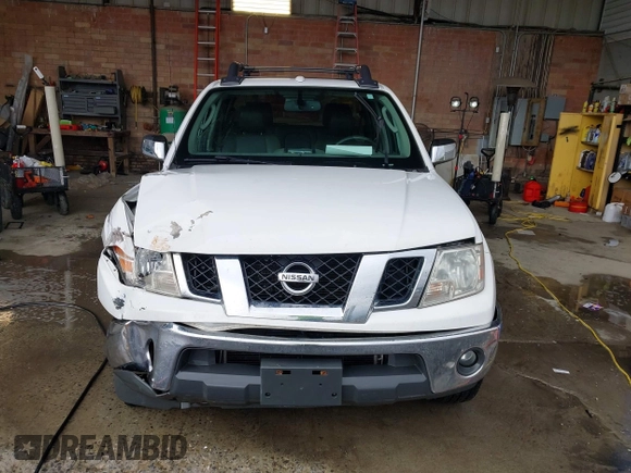 2011 Nissan Frontier Pro-4X with VIN 1N6AD0EV3BC409184, listed as a IAAI auction lot 42122823 with 209,669 mi miles and . Bid and sale history available at DreamBid. Image 12.