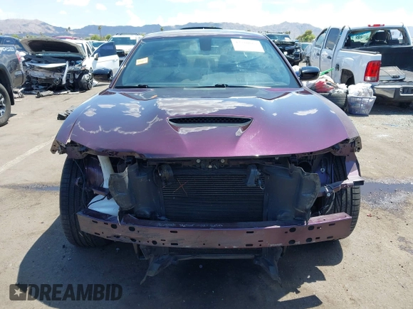 2021 Dodge Charger R/T with VIN 2C3CDXCT2MH574377, listed as a IAAI auction lot 42760667 with 49,295 mi miles and . Bid and sale history available at DreamBid. Image 13.
