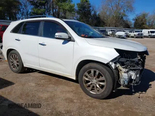 2011 Kia Sorento SX with VIN 5XYKW4A27BG137478, listed as a IAAI auction lot 41187644 with 112,756 mi miles. Bid and sale history available at carsss.com. Image 1.
