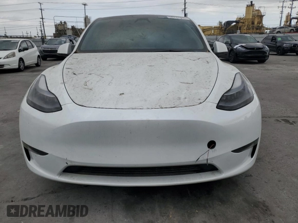 2023 Tesla Model Y Performance z VIN 7SAYGDEFXPF801908, wystawiony jako Copart lot #50737655 z przebiegiem Nie podano mil oraz Szkoda całkowita • Salvage title. Historia ofert i sprzedaży dostępna na DreamBid. Obrazek 5.
