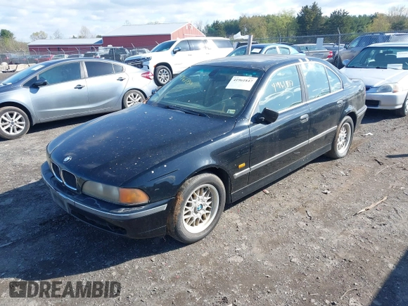 2000 BMW 5 Series 528iA with VIN WBADM6348YGU11038, listed as a IAAI auction lot 41961847 with 195,493 mi miles. Bid and sale history available at carsss.com. Image 2.