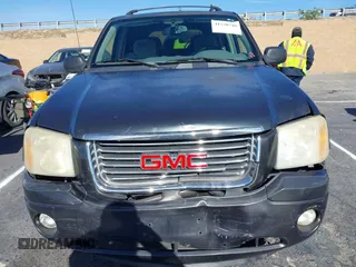 2006 GMC Envoy SLT with VIN 1GKDS13S962184712, listed as a IAAI auction lot 41250740 with 226,986 mi miles. Bid and sale history available at carsss.com. Image 6.