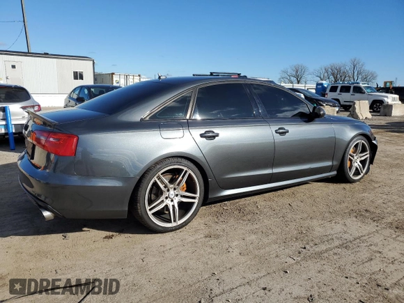 2015 Audi A6 Prestige z VIN WAUHGAFC2FN006252, wystawiony jako Copart lot #80515204 z przebiegiem 131 466 mil mil oraz Szkoda całkowita • Salvage title. Historia ofert i sprzedaży dostępna na DreamBid. Obrazek 3.