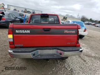1999 Nissan Frontier XE with VIN 1N6ED26Y4XC313142, listed as a Copart auction lot 85777354 with 122,822 mi miles and Salvage title. Bid and sale history available at DreamBid. Image 6.