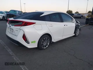 2020 Toyota Prius LE z VIN JTDKARFPXL3154734, wystawiony jako IAAI lot #41798874 z przebiegiem 96 255 mil mil oraz . Historia ofert i sprzedaży dostępna na DreamBid. Obrazek 4.