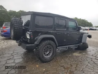 2023 Jeep Wrangler Sport with VIN 1C4HJXDN9PW638737, listed as a Copart auction lot 71367284 with 12,054 mi miles and Salvage Title. Bid and sale history available at DreamBid. Image 3.