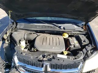 2014 Dodge Grand Caravan SXT z VIN 2C4RDGCG3ER155734, wystawiony jako Copart lot #86000724 z przebiegiem 175 681 mil mil oraz Szkoda całkowita • Salvage title. Historia ofert i sprzedaży dostępna na DreamBid. Obrazek 12.