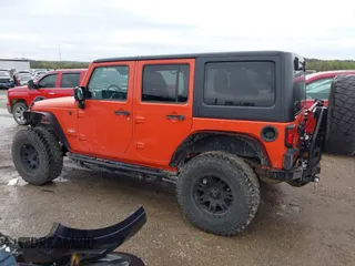2015 Jeep Wrangler Unlimited Sahara with VIN 1C4BJWEG6FL603265, listed as a IAAI auction lot 41956606 with 70,983 mi miles. Bid and sale history available at carsss.com. Image 14.