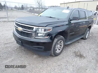 2016 Chevrolet Suburban LT with VIN 1GNSKHKCXGR478707, listed as a IAAI auction lot 41183747 with 157,893 mi miles. Bid and sale history available at carsss.com. Image 2.