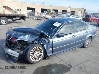 2003 BMW 3 Series 330i with VIN WBAEV53453KM03321, listed as a IAAI auction lot 41134433 with 186,586 mi miles. Bid and sale history available at carsss.com. Image 19.