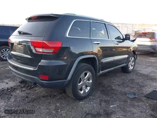 2011 Jeep Grand Cherokee Limited with VIN 1J4RR5GG6BC580766, listed as a IAAI auction lot 41618505 with 230,000 mi miles. Bid and sale history available at carsss.com. Image 4.