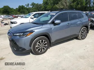 2023 Toyota Corolla Cross Hybrid S z VIN 7MUFBABG1PV009873, wystawiony jako Copart lot #54057015 z przebiegiem 26 517 mil mil oraz Szkoda całkowita • Salvage title. Historia ofert i sprzedaży dostępna na DreamBid. Obrazek 1.