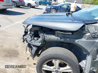 2015 Ford Escape SE with VIN 1FMCU9G98FUB04601, listed as a IAAI auction lot 42020737 with 176,487 mi miles and . Bid and sale history available at DreamBid. Image 13.