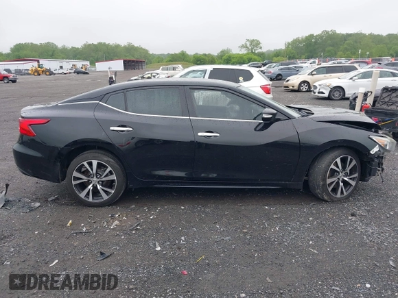 2018 Nissan Maxima SL z VIN 1N4AA6AP6JC379737, wystawiony jako IAAI lot #42255490 z przebiegiem 145 370 mil mil oraz . Historia ofert i sprzedaży dostępna na DreamBid. Obrazek 14.