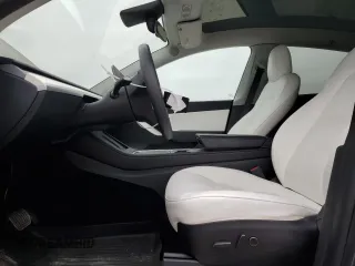 2022 Tesla Model Y Long Range with VIN 7SAYGDEE1NF315198, listed as a Copart auction lot 50399005 with 33,357 mi miles and Salvage Title. Bid and sale history available at DreamBid. Image 7.