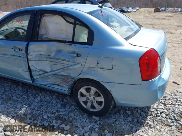 2007 Hyundai Accent GLS with VIN KMHCN46C57U159120, listed as a IAAI auction lot 42021811 with 114,564 mi miles. Bid and sale history available at carsss.com. Image 6.