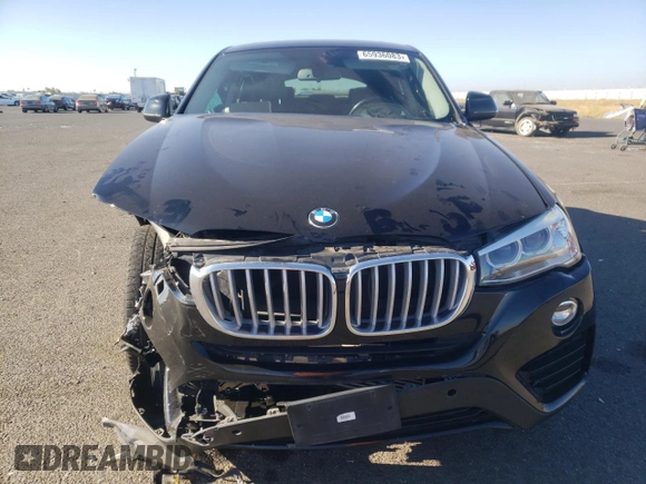 2015 BMW X4 xDrive28i with VIN 5UXXW3C53F0M87790, listed as a Copart auction lot 65936083 with 0 mi miles. Bid and sale history available at carsss.com. Image 5.