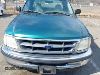 1998 Ford F-150 with VIN 1FTZF1723WNC12776, listed as a IAAI auction lot 41599872 with 125,007 mi miles and . Bid and sale history available at DreamBid. Image 12.