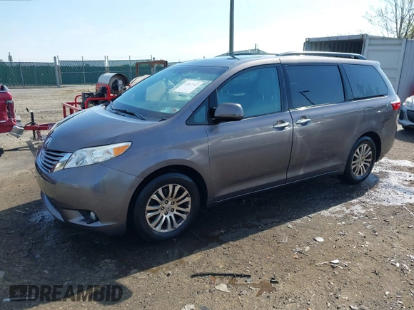 2015 Toyota Sienna XLE with VIN 5TDYK3DC9FS685768, listed as a IAAI auction lot 42062942 with 132,242 mi miles. Bid and sale history available at carsss.com. Image 17.