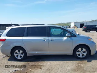2015 Toyota Sienna LE AAS with VIN 5TDKK3DC5FS642583, listed as a IAAI auction lot 42110445 with 61,668 mi miles. Bid and sale history available at carsss.com. Image 13.