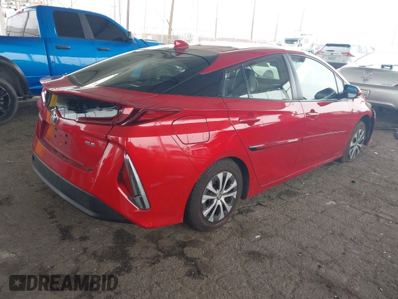 2021 Toyota Prius LE with VIN JTDKAMFP6M3189145, listed as a IAAI auction lot 42021116 with 80,722 mi miles and . Bid and sale history available at DreamBid. Image 4.